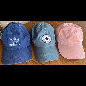 3 hats. Converse, Nike and adidas hats.